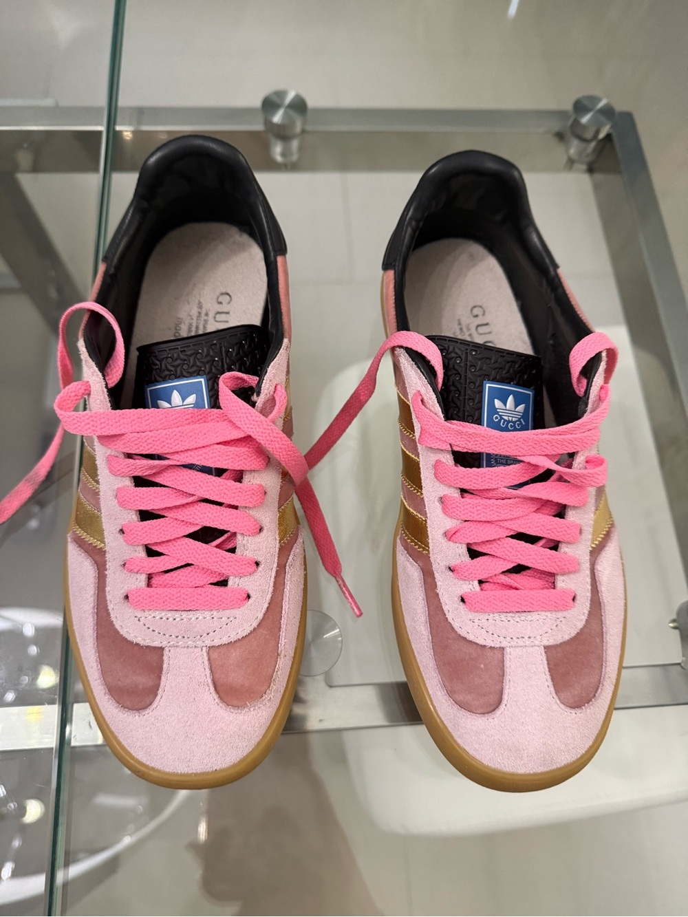 Gucci Pink Suede Low-Top Sneakers with Gold Stripes